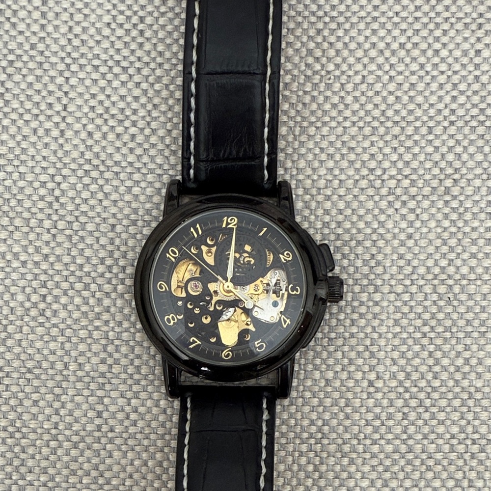 Black and Gold Skeleton Watch